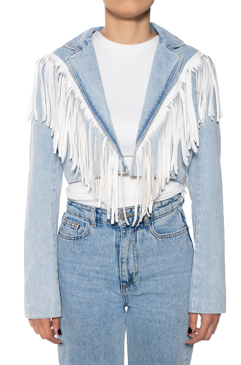 cropped denim western inspired jacket with a sharp collar lined with white fringe