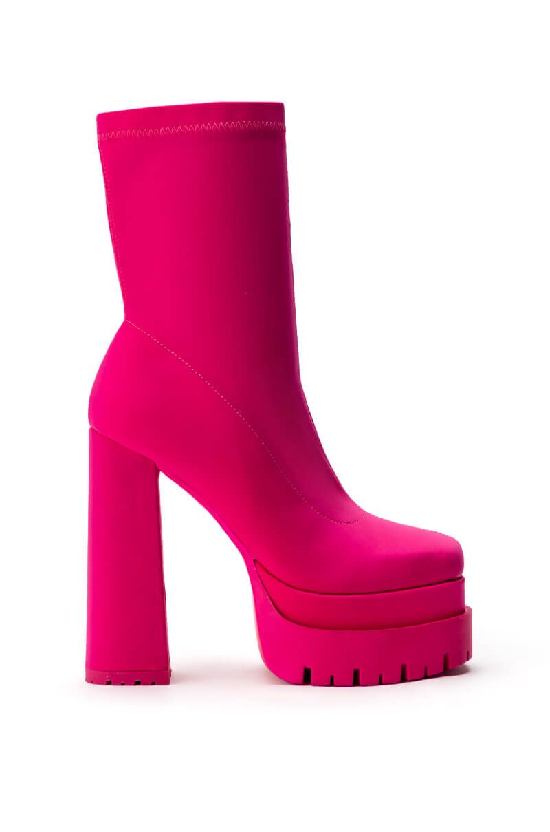 hot pink platform ankle boots with a chunky sole