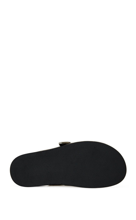 brown snake print slip on flat mules with a western inspired belted accent on the upper