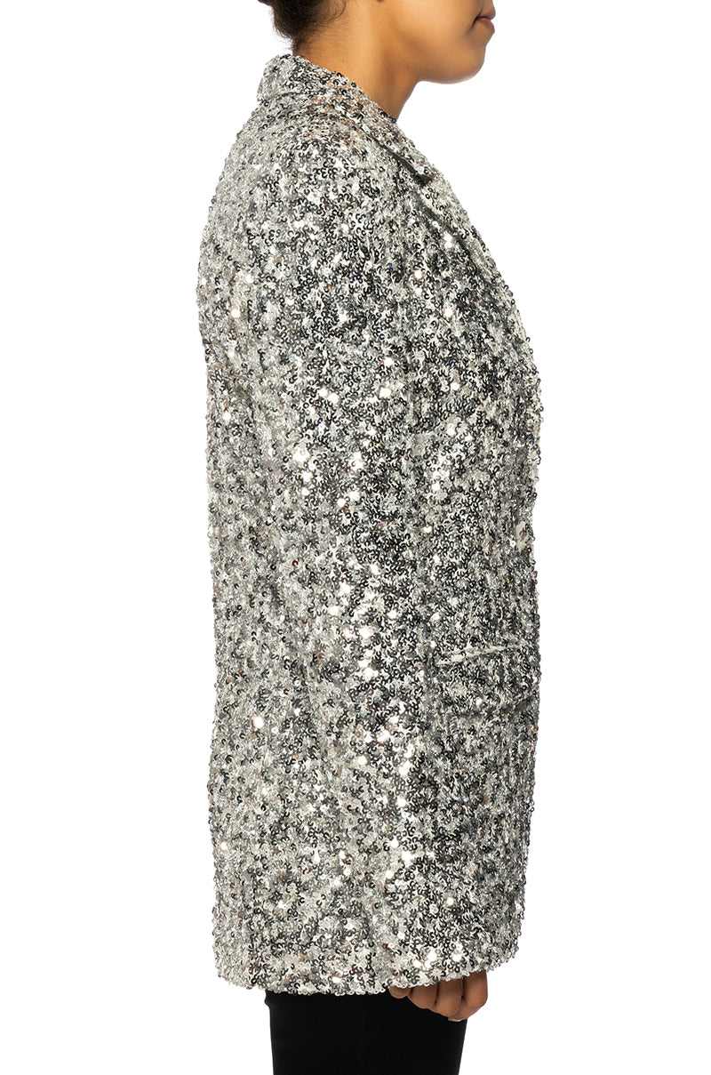 side view of shiny silver sequin statement jacket with a classic silhouette