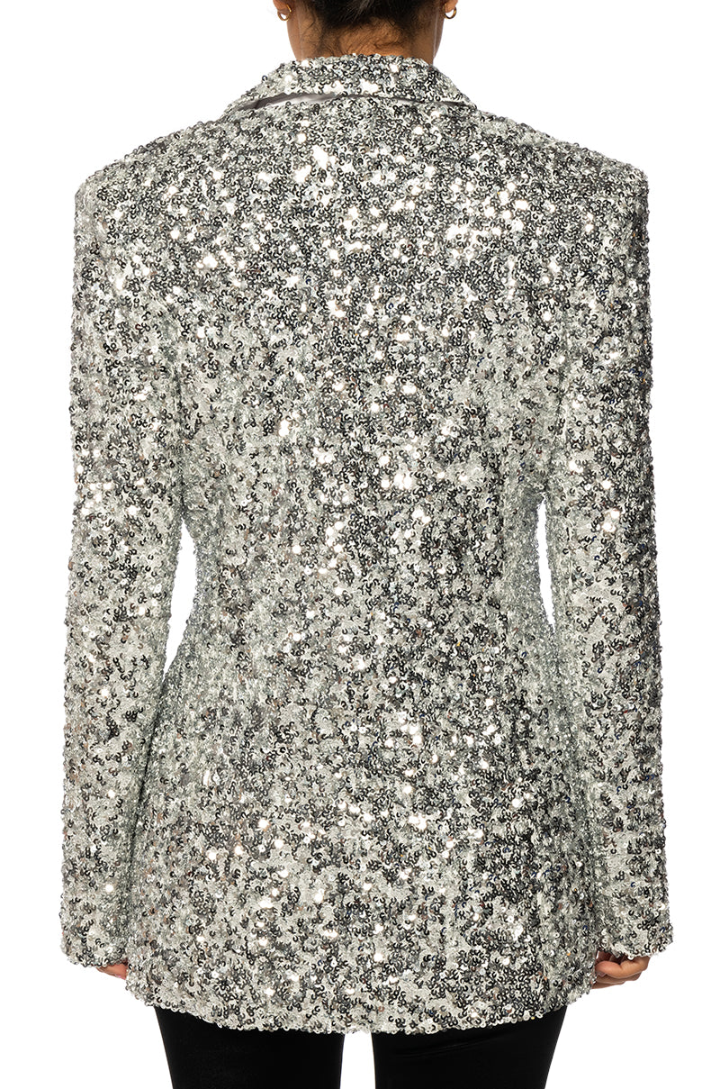 back view of shiny silver sequin statement jacket with a classic silhouette
