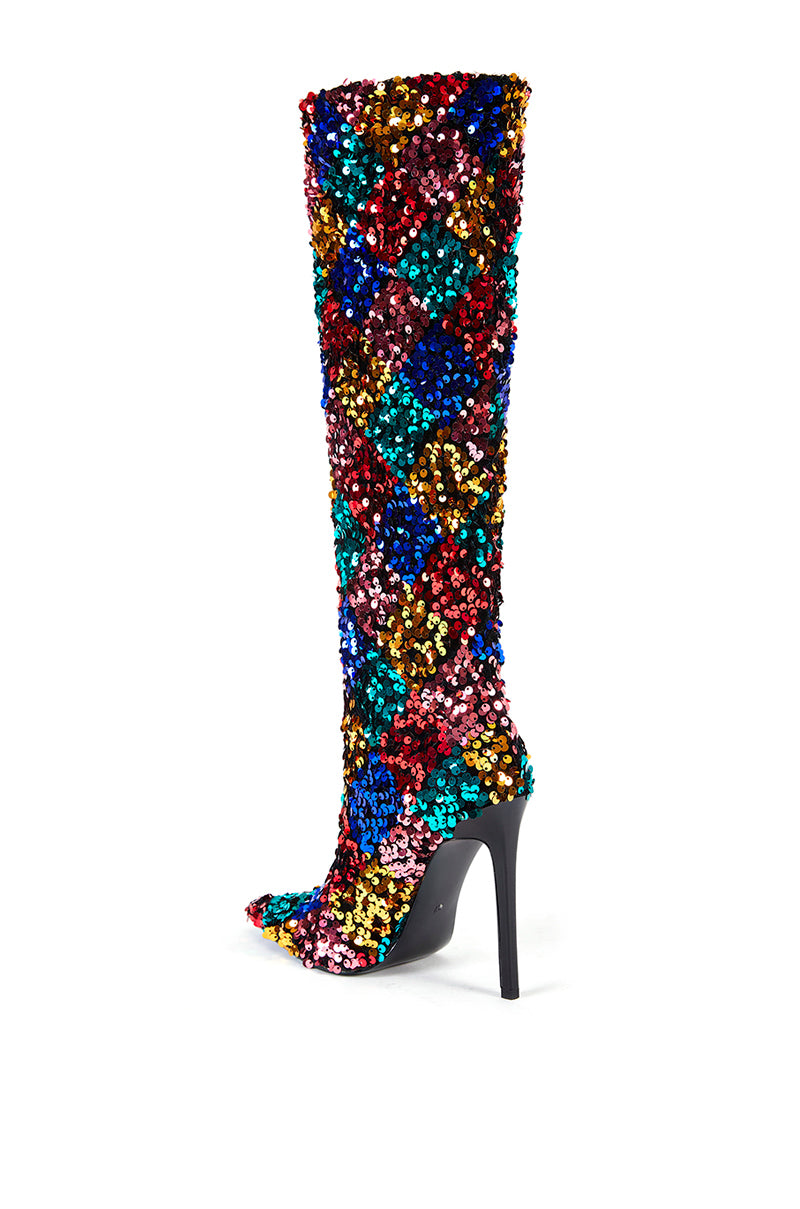 back view of pointed toe knee high boots with multicolored checker patterned sequins all over the shoe