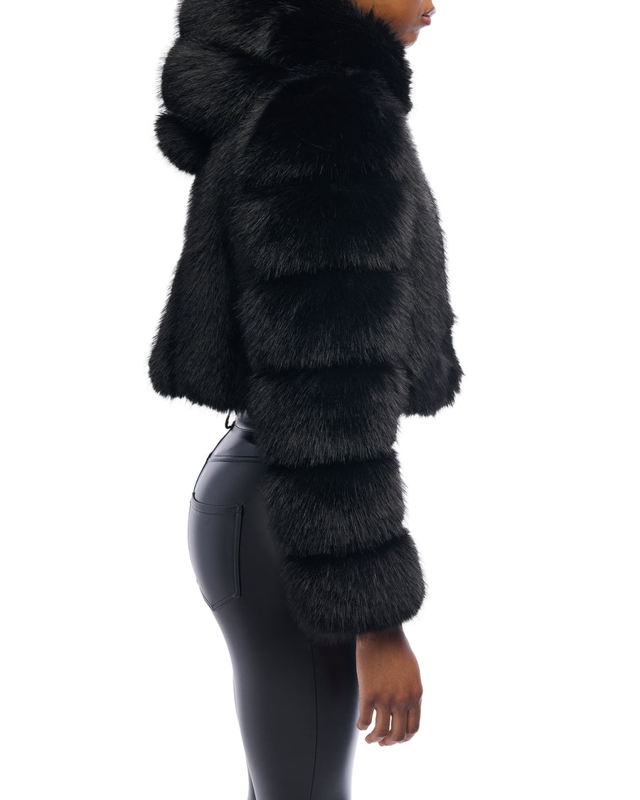 black faux fur statement jacket with a cropped silhouette, zip closure, and hood