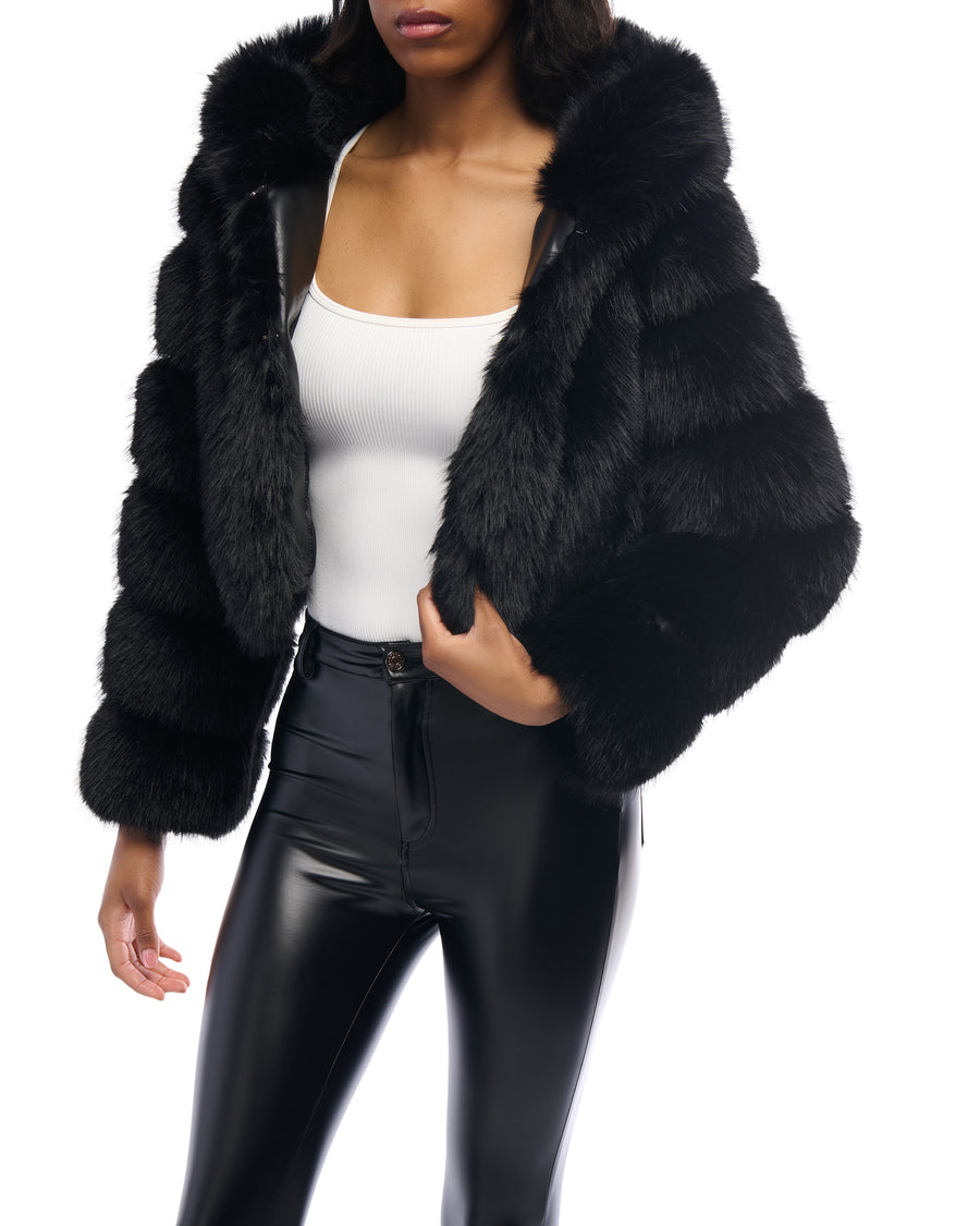 black faux fur statement jacket with a cropped silhouette, zip closure, and hood