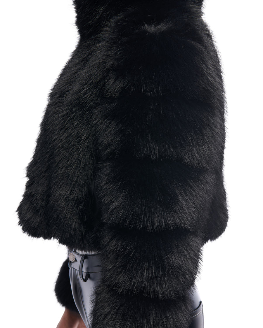 black faux fur statement jacket with a cropped silhouette, zip closure, and hood