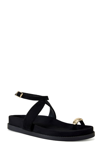 black flat open toe sandals with black faux suede toe strap and an adjustable ankle strap closure with gold hardware accents