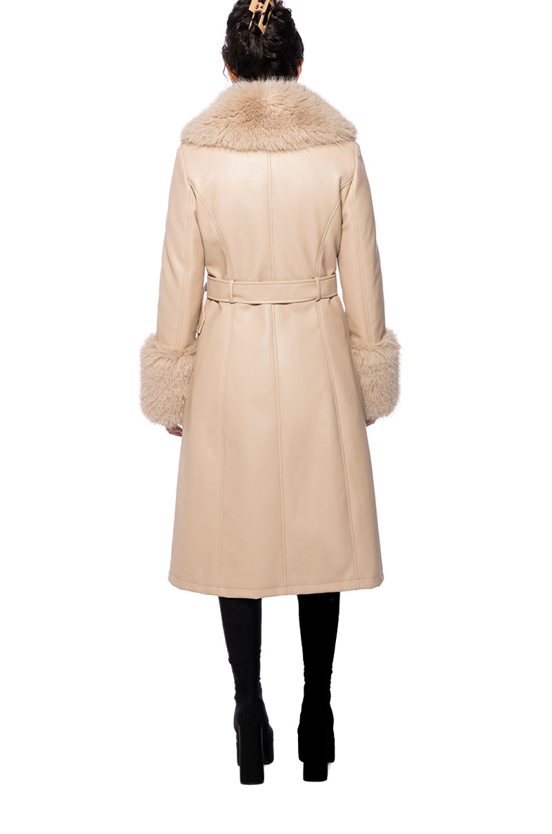 back view of beige faux leather knee length jacket with cinched belt waist and faux fur collar and cuffs