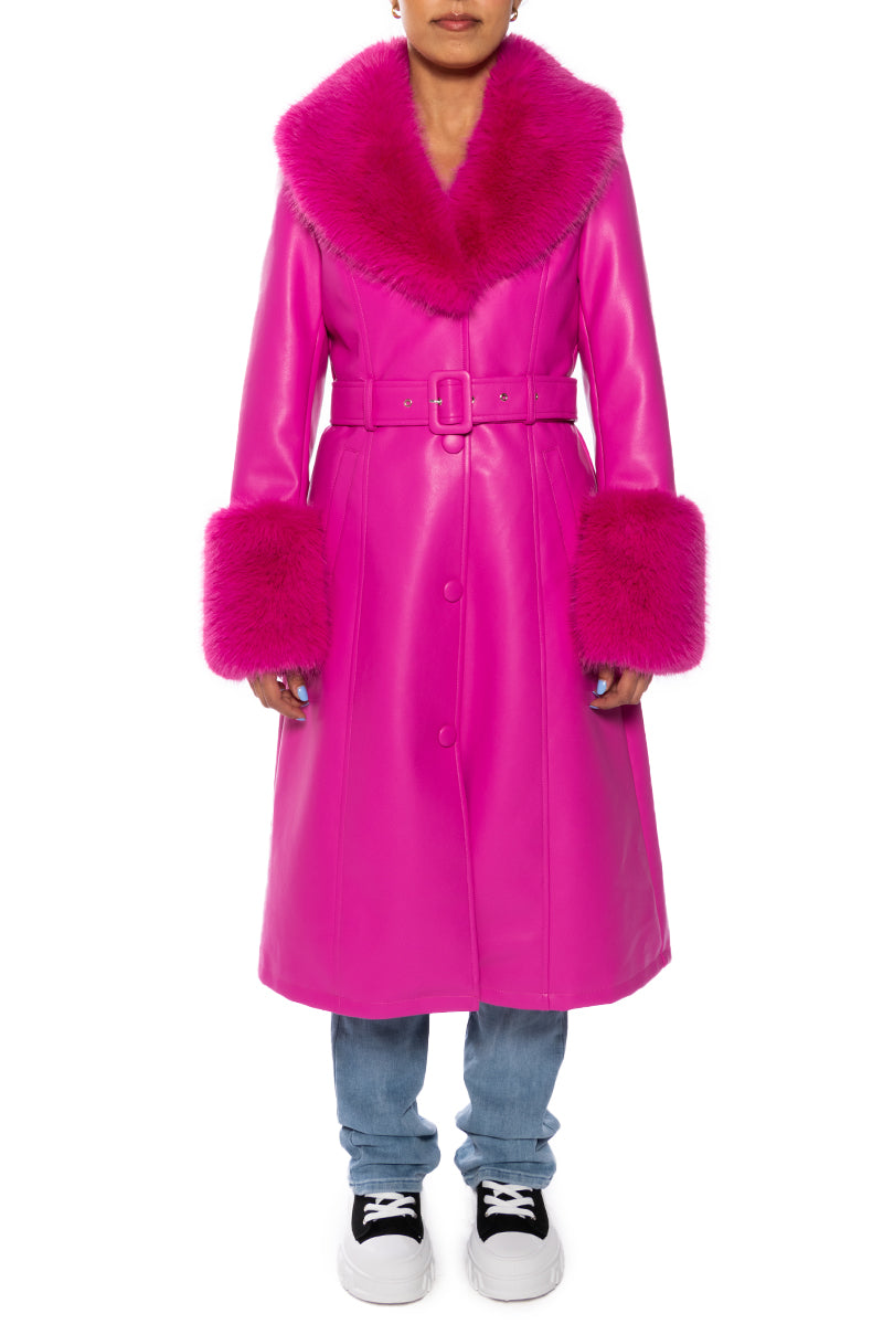 front view of hot pink faux leather trench coat with cinched belt accent and faux fur collar and cuffs