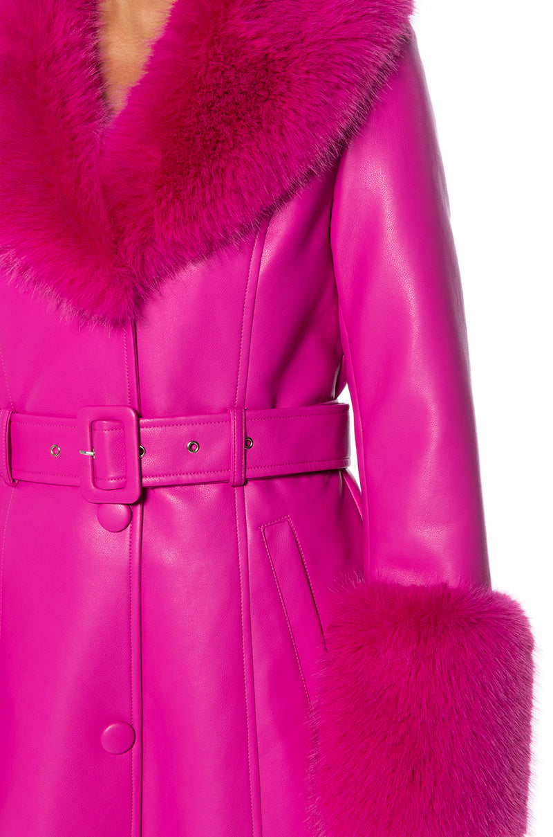 close up of hot pink faux leather trench coat with cinched belt accent and faux fur collar and cuffs