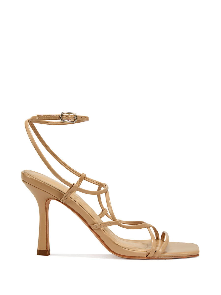 nude strappy heeled open toe sandals with a square toe and lace up straps 