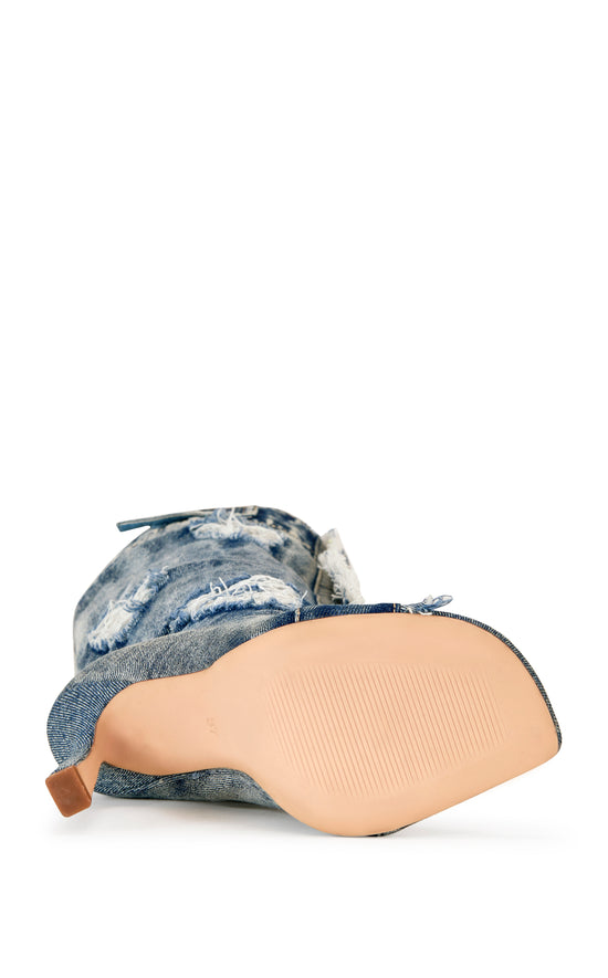 denim knee high western boot with a peep toe, stiletto heel and distressed patches on the shaft