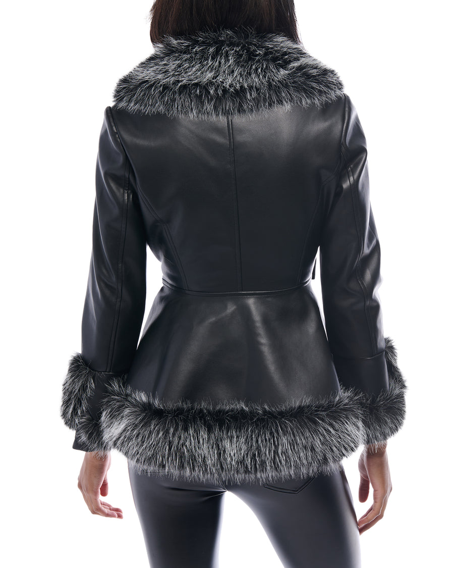 black faux leather statement jacket with a cinched waist tie up closure and black and white faux fur lined collar and cuffs