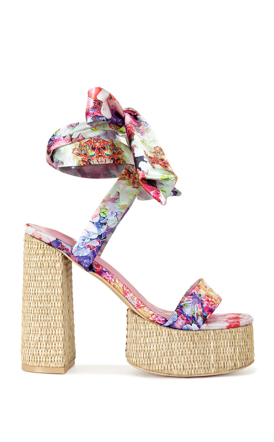 platform open toe statement heels with a raffia lined sole and floral printed wrap up scarves