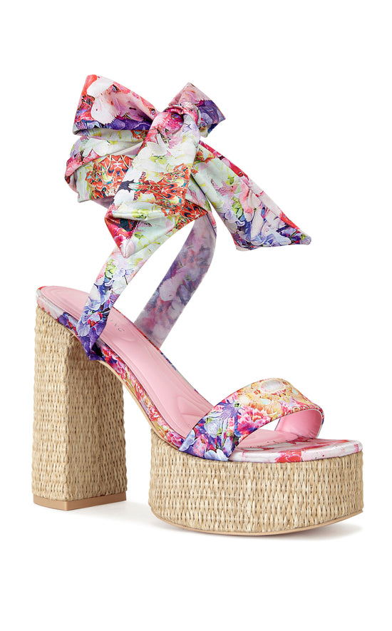 platform open toe statement heels with a raffia lined sole and floral printed wrap up scarves