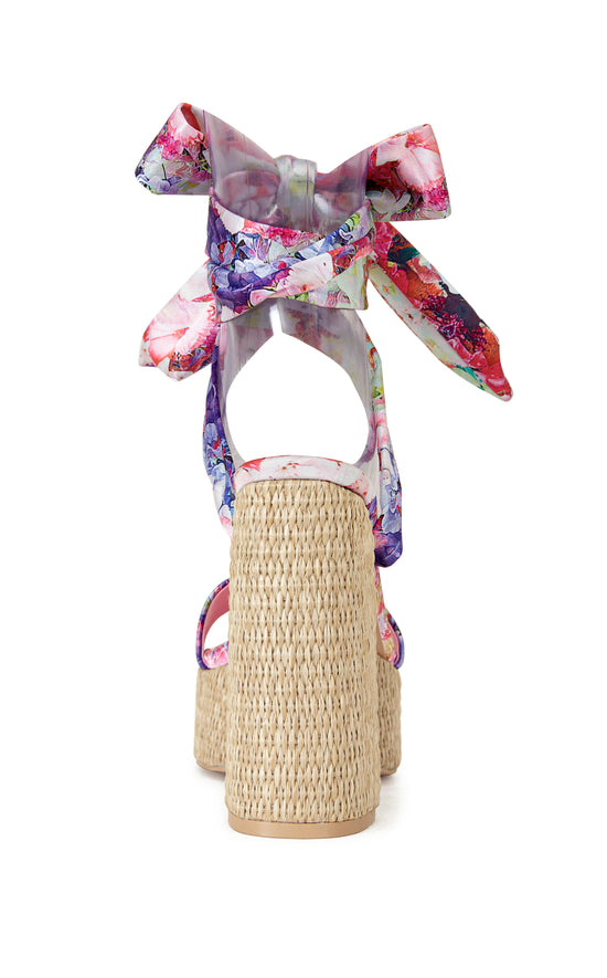 platform open toe statement heels with a raffia lined sole and floral printed wrap up scarves