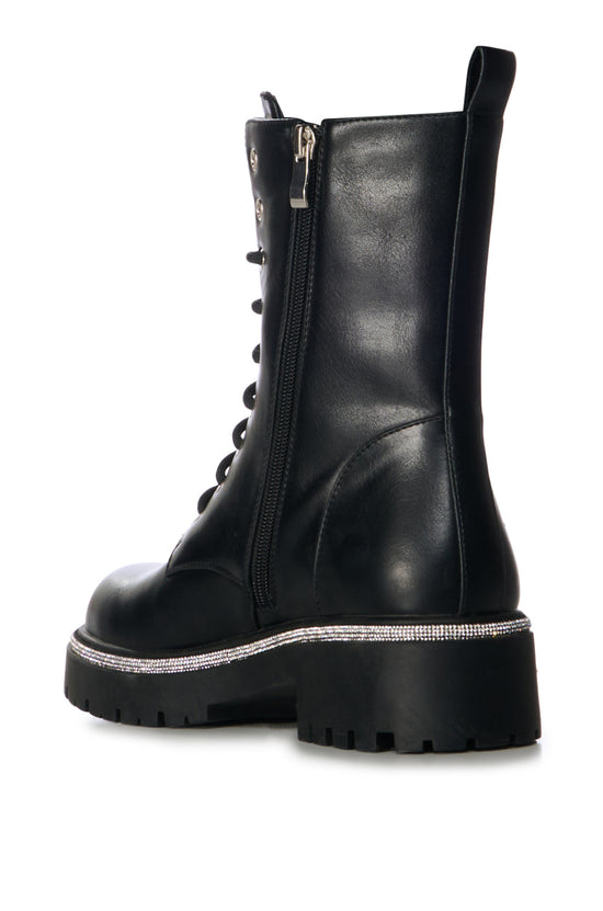 black faux leather combat bootie with a lace up design, chunky rhinestone details on the front, and a crystal lined sole
