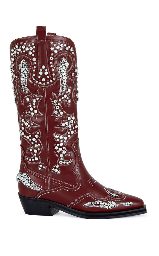 red faux leather mid calf length western boots with a mini block heel, and a rhinestone embellished western boot design all over the boot.