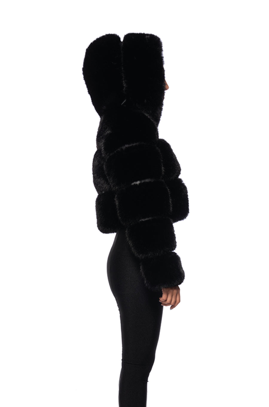 side view of black zip up faux fur jacket with hood