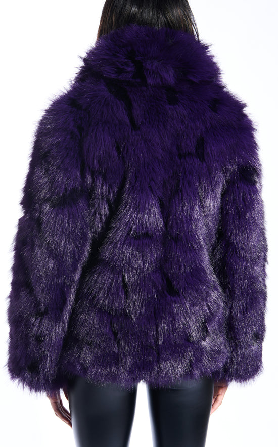 dark purple faux fur statement coat with an oversized collar and two front pockets