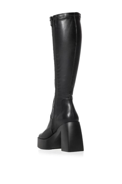 back view of black platform faux leather knee high boots made with our 4 way stretch material