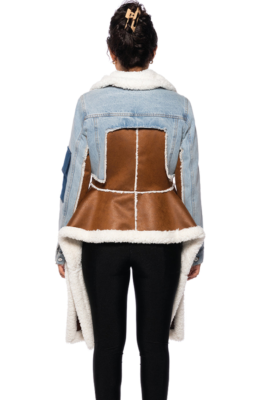 back view of asymmetric cut shearling jacket with denim jacket style sleeves and a shearling collar