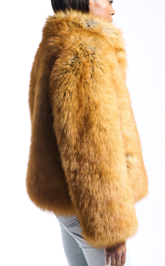 light brown faux fur statement coat with a mini collar