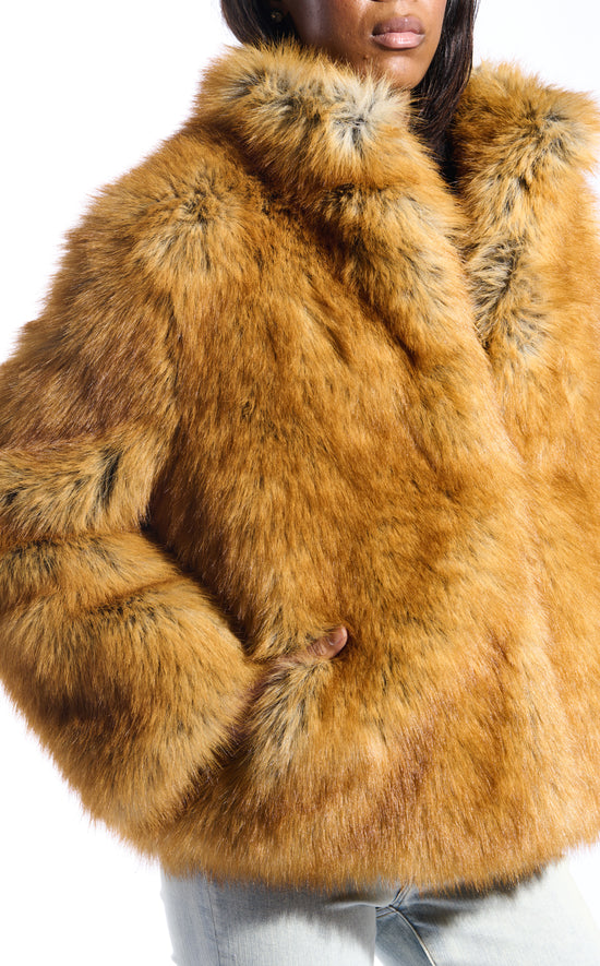 light brown faux fur statement coat with a mini collar