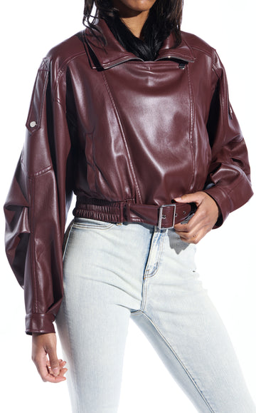 buttery soft burgundy faux leather statement jacket with a zip up front closure, puffy sleeves, and a belted accent on the bottom