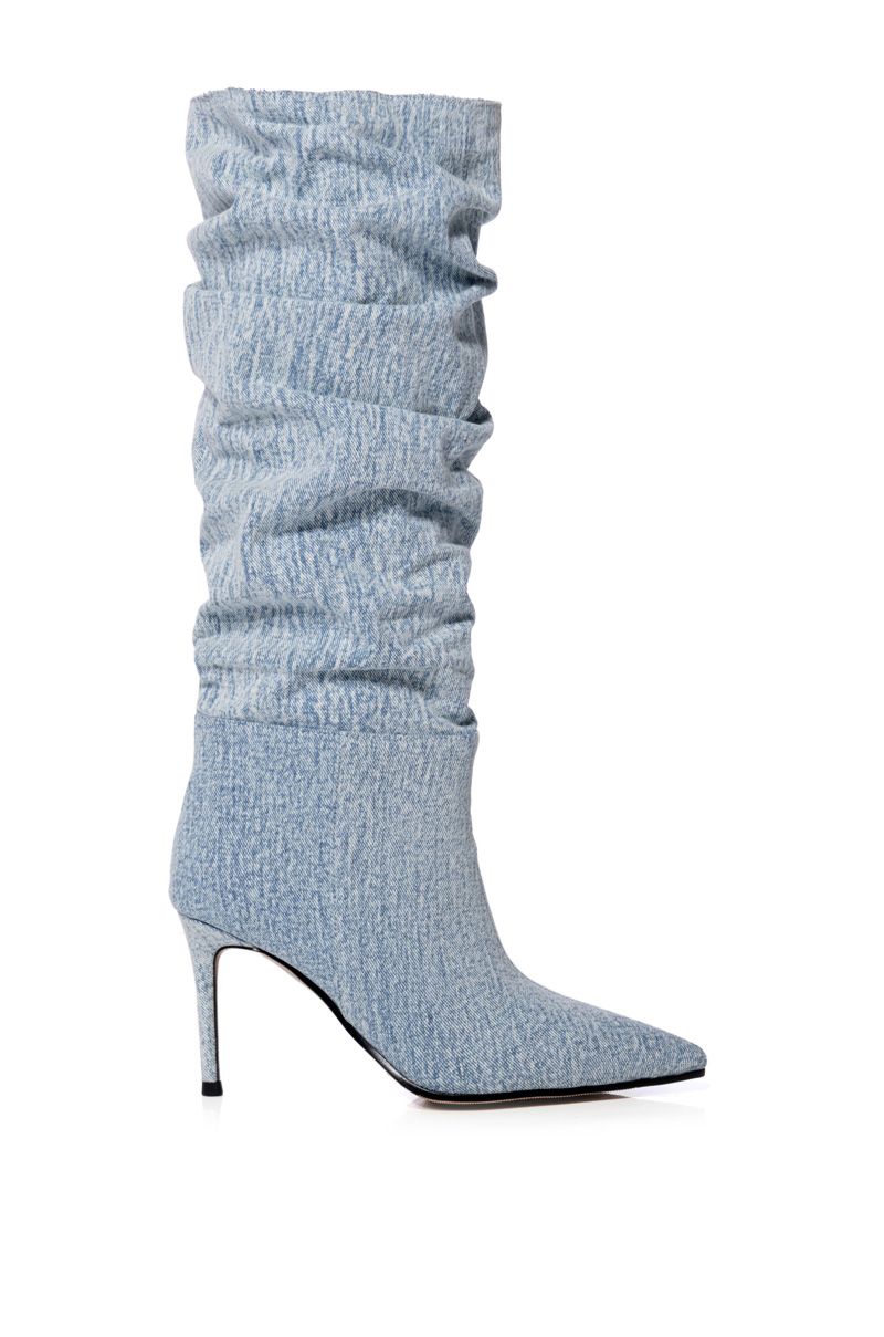light wash blue denim pointed toe stiletto mid calf boots with scrunched denim upper