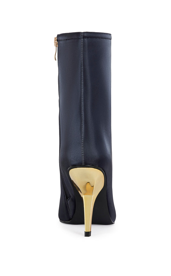navy blue liquid lux ankle bootie with a gold hardware stiletto heel and a pointed toe