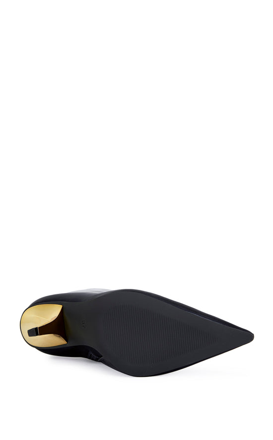 navy blue liquid lux ankle bootie with a gold hardware stiletto heel and a pointed toe