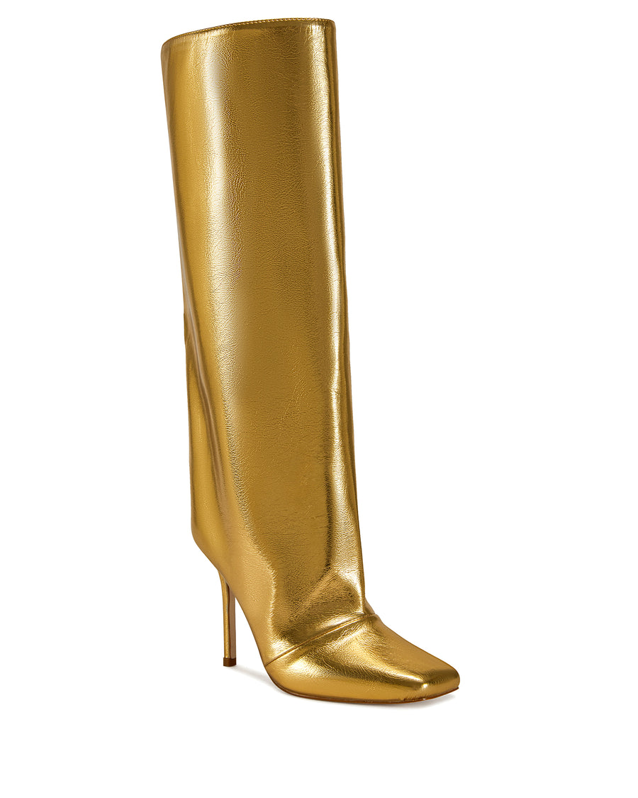 gold faux leather fashion forward knee high boots with a stiletto heel and a widened shaft with a subtle drape