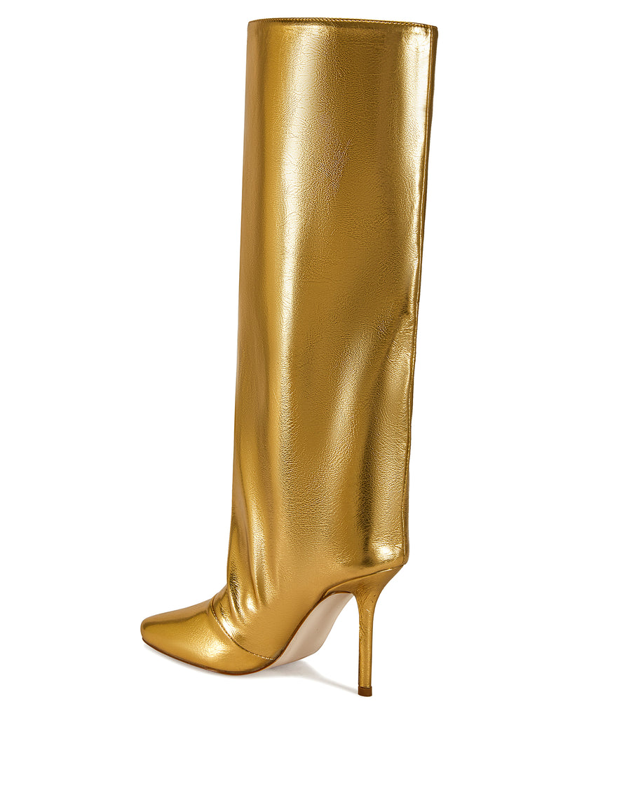 gold faux leather fashion forward knee high boots with a stiletto heel and a widened shaft with a subtle drape