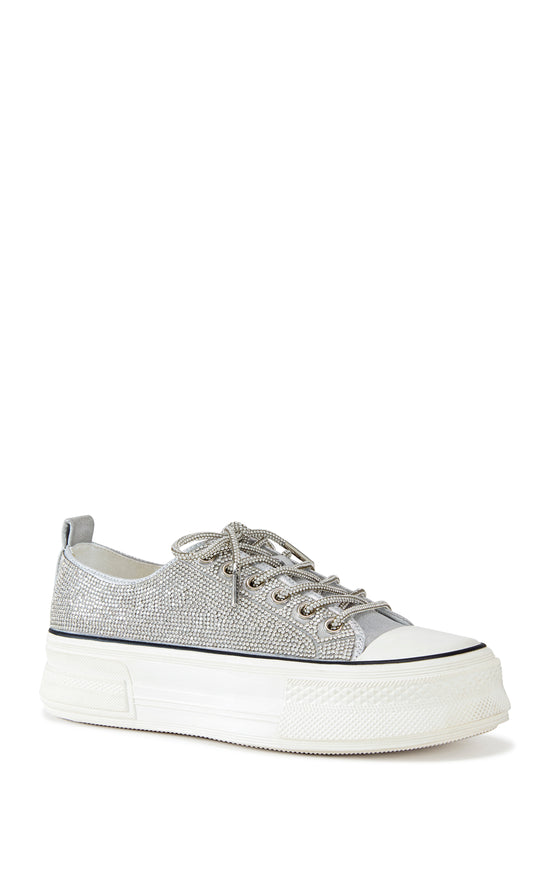 silver lace up sneaker with a white sole and sparkly glitter embellishments on the upper