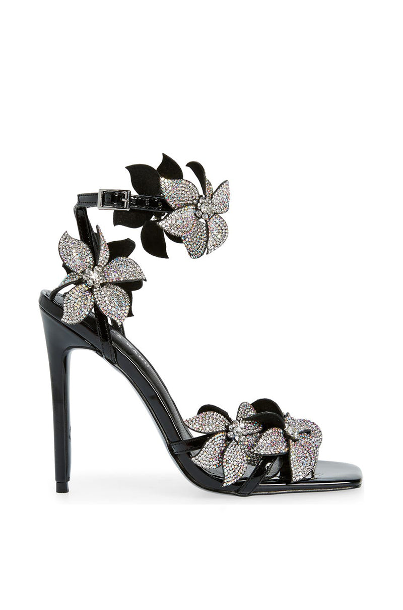 black open toe square cut stiletto heels with rhinestone embellished flowers on straps