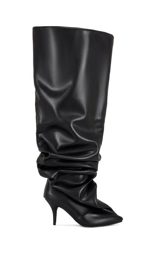 black faux leather statement knee high boot with a scrunched shaft, a stiletto heel, and an oversized shaft opening