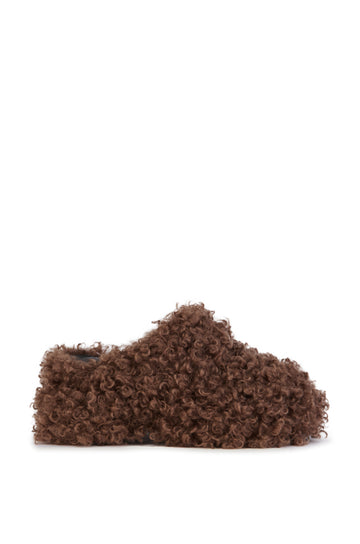 brown curly faux fur platform mules with a slip on fit and a soft inner lining