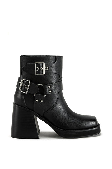 black faux leather biker booties with a block heel and silver belt buckle details on the shaft