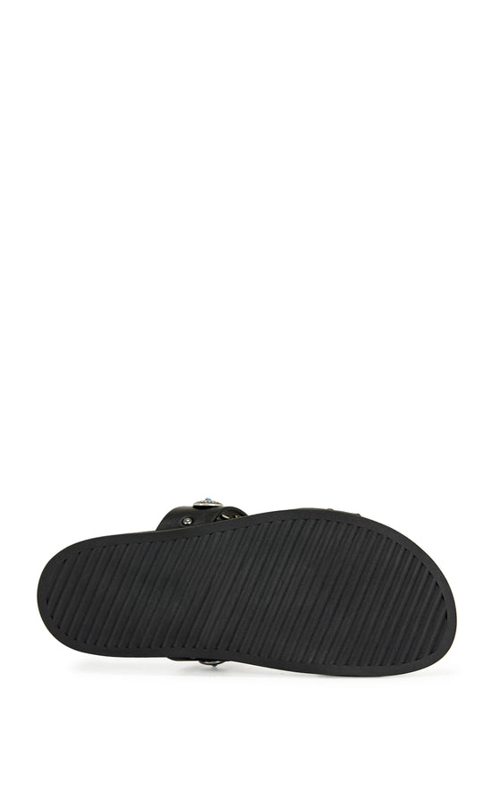 black faux leather open toe flat sandals with two foot straps embellished with turquoise and silver studded accents