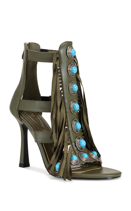 green faux leather strappy open toe sandals with a stiletto heel, and a green upper featuring faux suede fringe and turquoise studded embellishments, and a zip up closure on the ankle