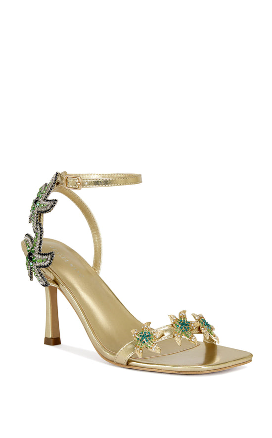 gold faux leather statement open toe sandals with a stiletto heel and multicolored rhinestone embellished star accents on the side of the adjustable ankle strap and the foot strap