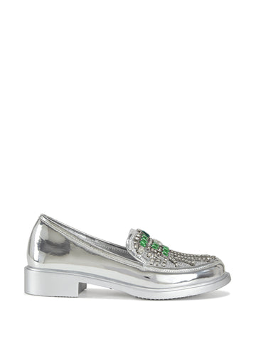 silver slip on loafers with a subtle heel and a rhinestone embellished upper featuring green rhinestone accents