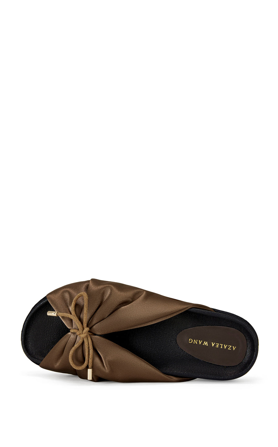 brown satin slip on sandals with a black sole and a bow accent on the upper