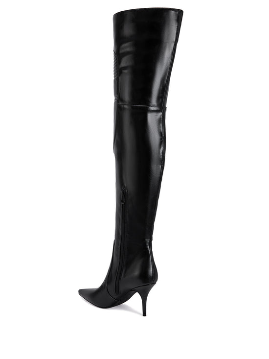 black faux leather thigh high boots with a stiletto heel, pointed toe, and ridged details on the shaft