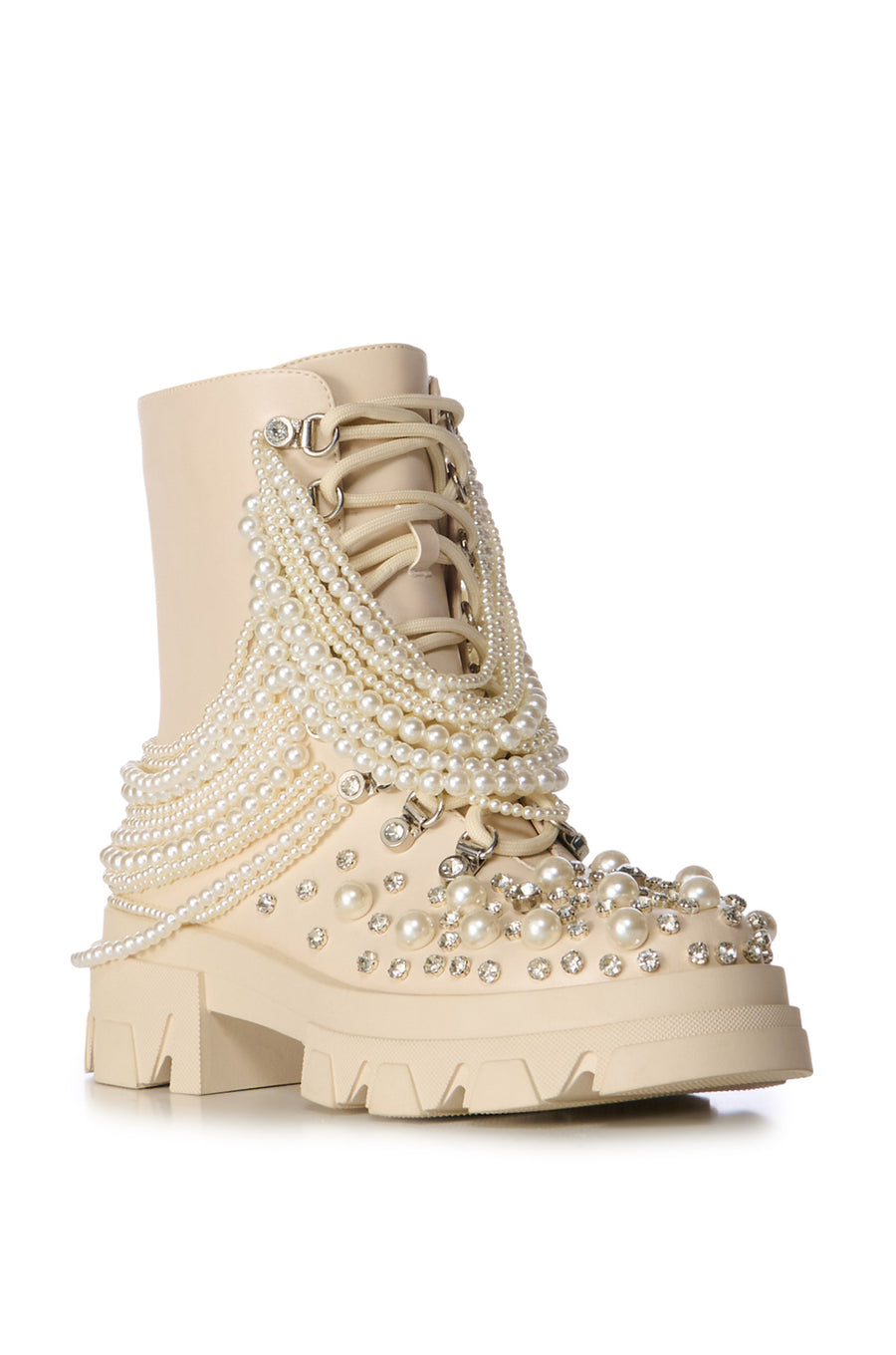 Cream chunky lace up combat boots embellished with faux pearls and pearl beaded chains draping on the shaft