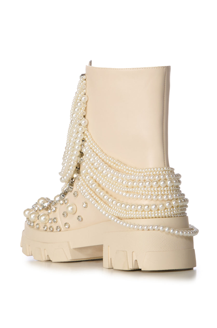 Cream chunky lace up combat boots embellished with faux pearls and pearl beaded chains draping on the shaft