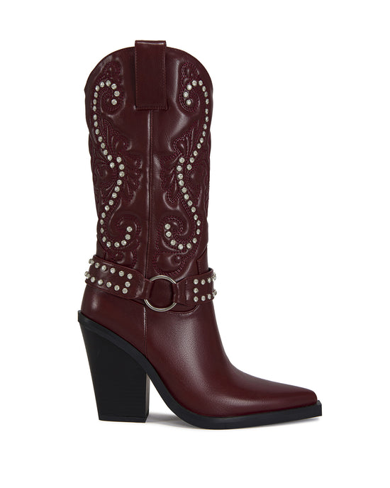 wine red faux leather statement western boots with a crystal embellishment on the Western design accent on the shaft