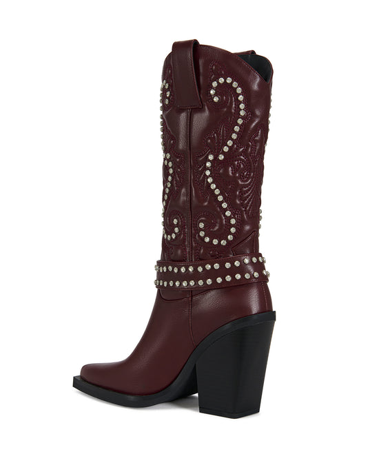 wine red faux leather statement western boots with a crystal embellishment on the Western design accent on the shaft