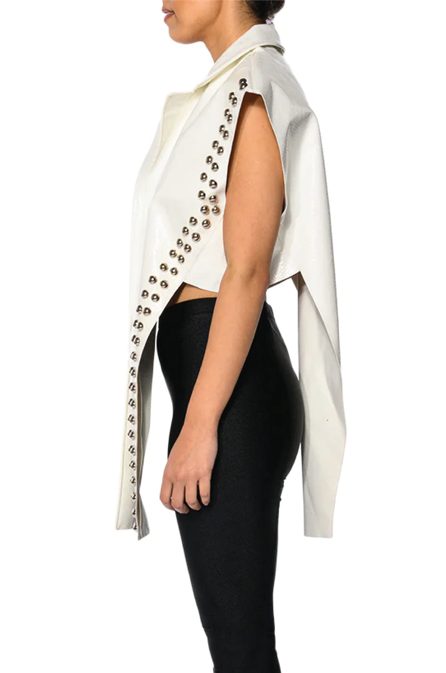 side view of white faux leather flared collar vest with studs along the sides