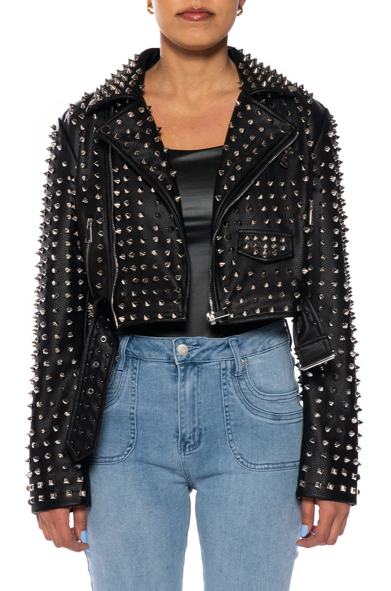 front view of edgy black faux leather moto jacket with scattered silver stud accents